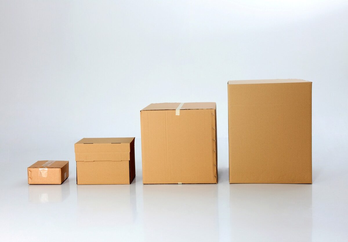 Different sizes of cardboard boxes small to large from left to right.